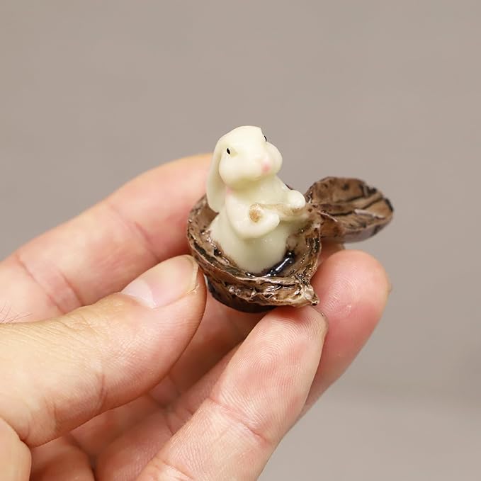 Miniature Bunny Rabbit Nut Boat, Dollhouse Bunny with Paddle in Boat, Mini Rabbit Sitting in Nutshell Boat, for Fairy Garden, Terrarium, Diorama or Mini Gardening, Miniature Woodland Decoration