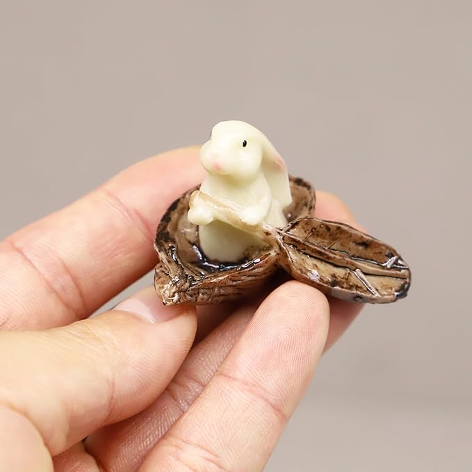 Miniature Bunny Rabbit Nut Boat, Dollhouse Bunny with Paddle in Boat, Mini Rabbit Sitting in Nutshell Boat, for Fairy Garden, Terrarium, Diorama or Mini Gardening, Miniature Woodland Decoration