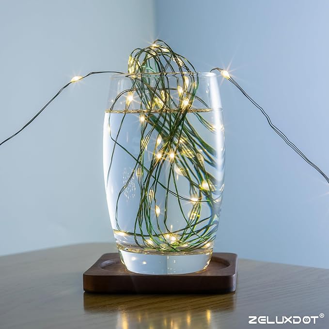 Fairy Lights Plug in,200FT 600LEDs Waterproof Led String Lights,8 Modes Remote Twinkle Light for Outdoor Indoor Christmas Wedding Birthday Garden Party Decorations,Green Wire,Warm White