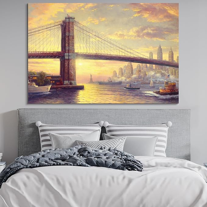 STUDIO HAVEN Thomas Kinkade Canvas Wall Art, Brooklyn Bridge NYC Skyline Golden Sunset Riverboats and Iconic Bridge Oil Painting Poster Landscape Wall Decor, Framed Prints for Home Decor, 24x16Inch