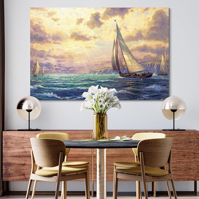 STUDIO HAVEN Thomas Kinkade Canvas Wall Art, Ocean Sailboats Golden Sunset Rushing Waves and Coastal Cliffs Oil Painting Poster Nautical Wall Decor, Framed Prints for Home Decor, 16x12Inch