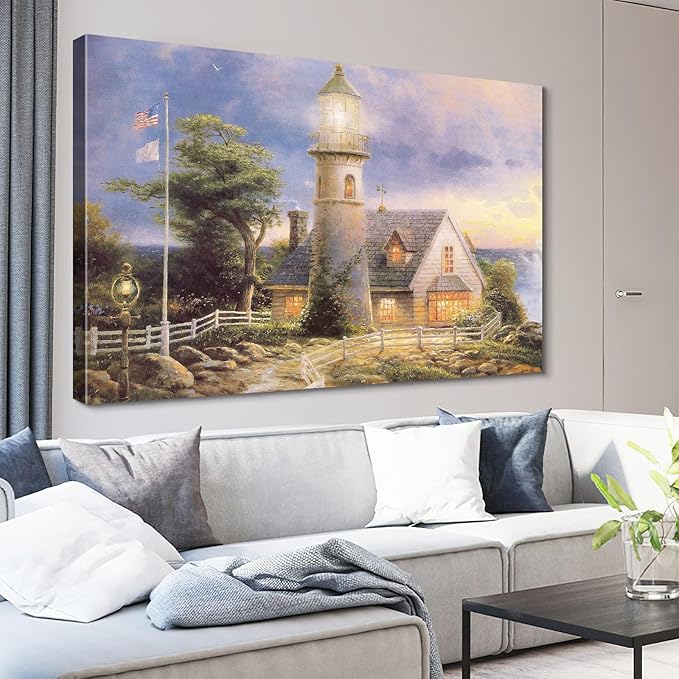 STUDIO HAVEN Thomas Kinkade Canvas Wall Art, Lighthouse Cottage Beacon with American Flag White Fence Ocean Sunset Oil Painting Poster Coastal Wall Decor, Framed Prints for Home Decor, 24x16Inch
