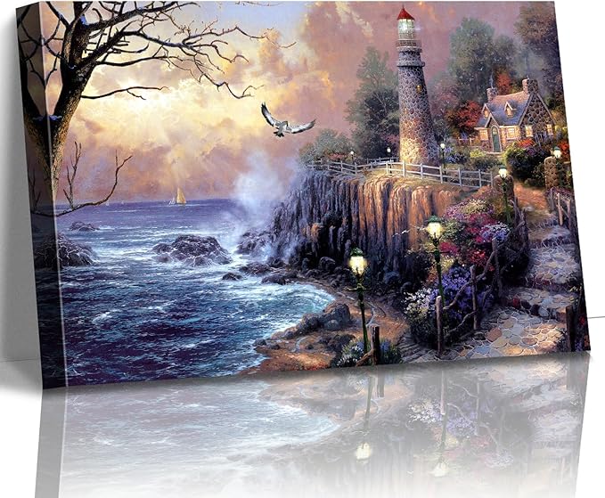 STUDIO HAVEN Thomas Kinkade Canvas Wall Art, Coastal Lighthouse Cottage Ocean Waves Glowing Beacon Seside Pathway Oil Painting Poster Landscape Wall Decor, Framed Prints for Home Decor, 28x20Inch