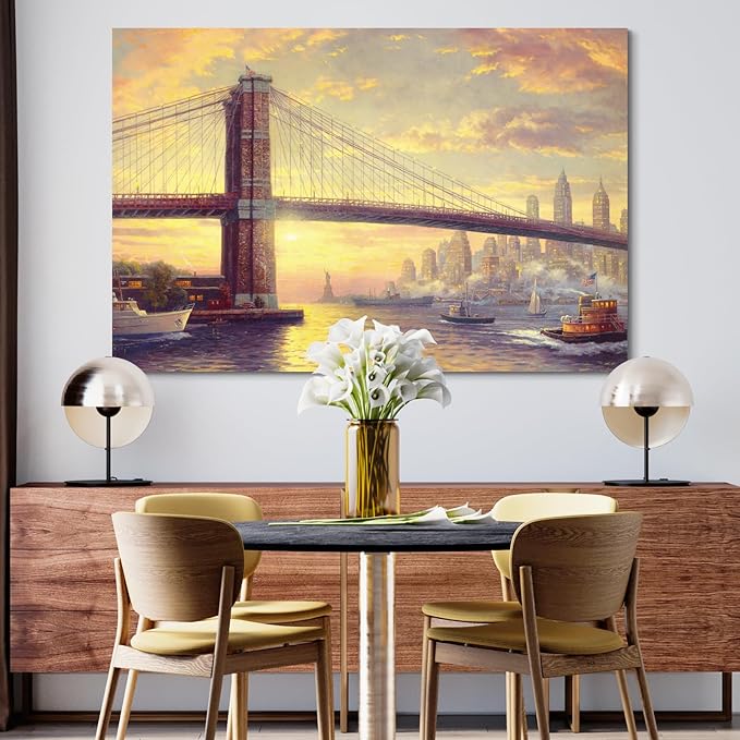 STUDIO HAVEN Thomas Kinkade Canvas Wall Art, Brooklyn Bridge NYC Skyline Golden Sunset Riverboats and Iconic Bridge Oil Painting Poster Landscape Wall Decor, Framed Prints for Home Decor, 16x12Inch