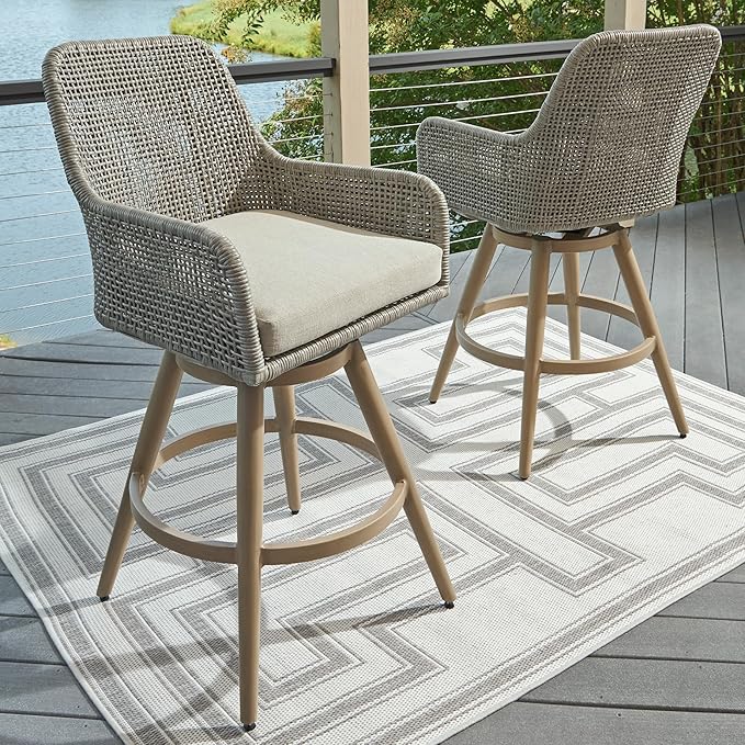 Signature Design by Ashley Seton Creek Casual Nuvella Weather Resistant Fabric, Resin Wicker Swivel Outdoor Bar Height Bar Stool with Cushion, Footrest and Armrest, Set of 2, Beige & Light Gray